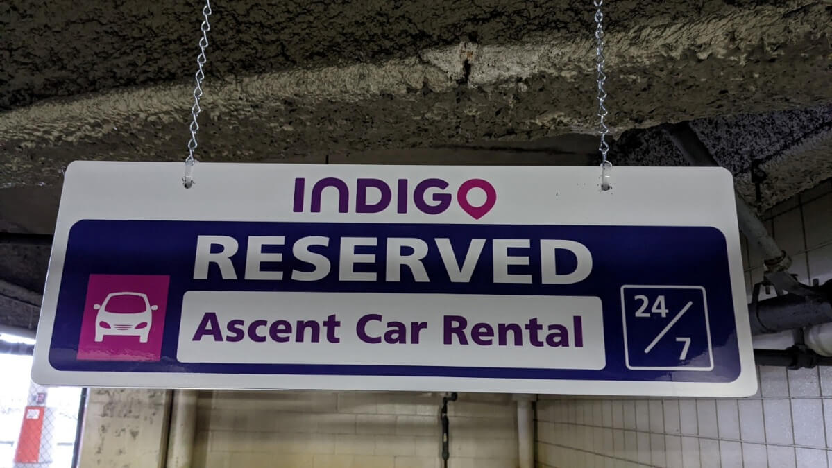 Ascent Car Rental Reserved Sign